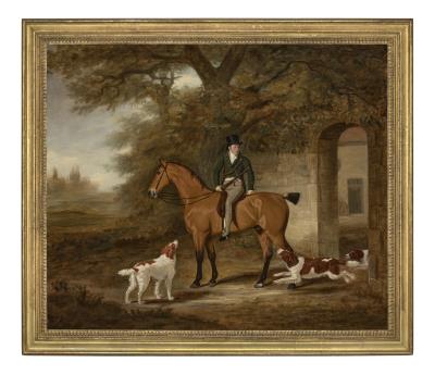 A gentleman, traditionally identified as Robert Day of Belgrave Hall, Leicestershire, mounted on a bay hunter outside a stable with three dogs