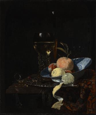 Still Life with a Roemer, an Orange, a Peach and Lemons in a Wanli Bowl, on a Ledge Draped with an Oriental Rug