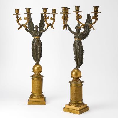 Pair of Empire Style Patinated and Gilt-Bronze Figural Four-Light Candelabra