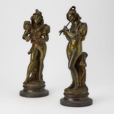 Pair of Patinated Bronze Figures