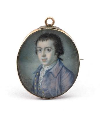 Portrait miniature on ivory of a young man wearing a blue overcoat
