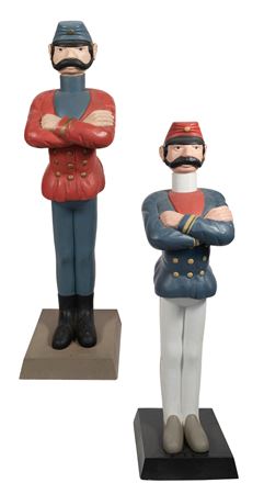 PAIR OF FOLK ART CARVED AND PAINTED SOLDIERS