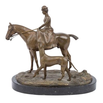 Amazon on horseback with hunting dog