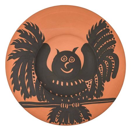 Owl with outstretched wings