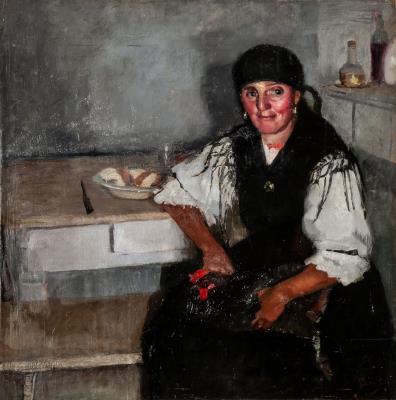 Asturian woman with rooster by the table