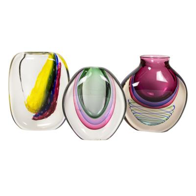 A suite of three Luigi Onesto Murano sommerso glass vases