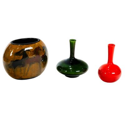 Three glazed earthenware vessels