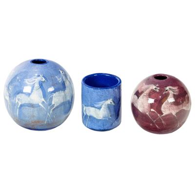Three glazed earthenware vessels