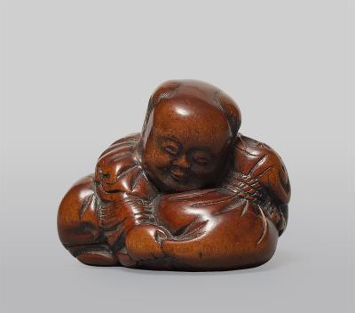 A boxwood netsuke of a karako