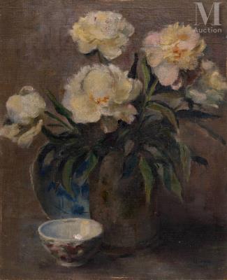 Peonies next to an antique object