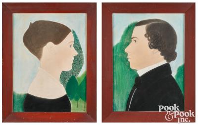 Pair of pastel profile portraits