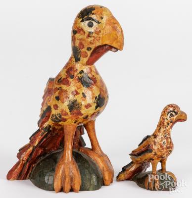 Two carved and painted eaglets