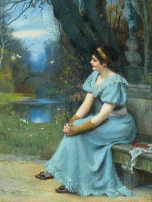 Lady in a blue dress in a park