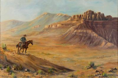 Desert landscape with cowboy