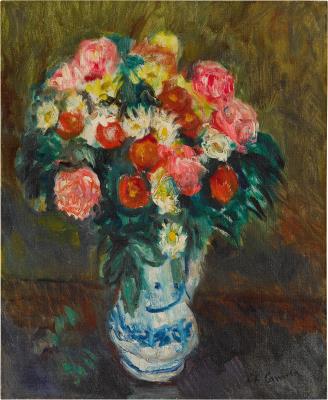 Fleurs mélangées dans un vase blanc et bleu