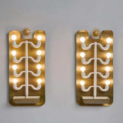 A Unique Pair of Wall Lights by Gio Ponti - Auction record, sale price, and art valuation. Compare with similar artists and explore comparable artworks.