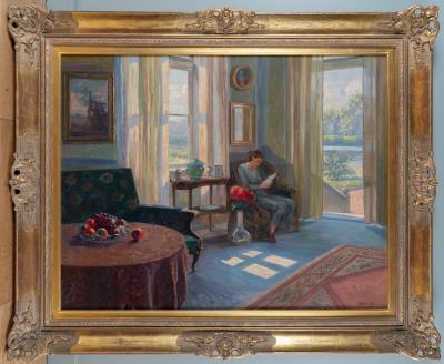 Woman Reading in a Sunlit Interior
