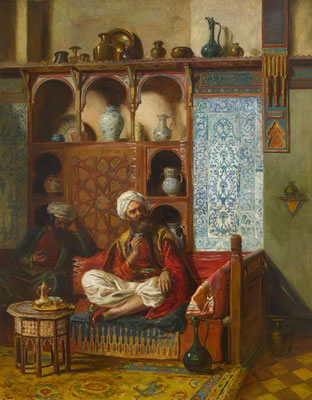 Arabs drinking tea in an interior