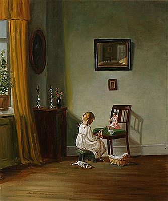 A girl plays with her dolls.