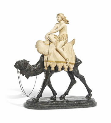 ORIENTALIST GROUP OF A WOMAN ON A CAMEL