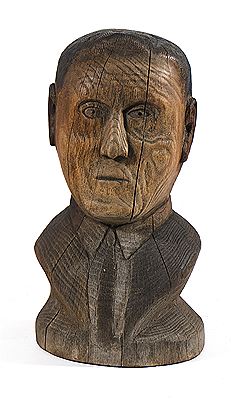 Carved wooden bust of a man
