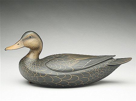 Hollow carved black duck