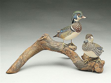 Pair of 1/3 size standing wood ducks by James Lapham - Auction record, sale price, and art valuation. Compare with similar artists and explore comparable artworks.