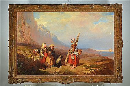 Three people and a dog on a rocky cliff