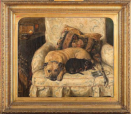"Les deux chiens Vic et Janny au repos dans un fauteuil"