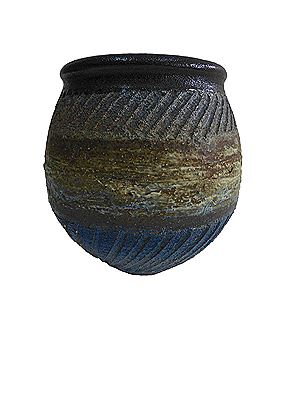 Thrown vessel with blue oxide and clay slip