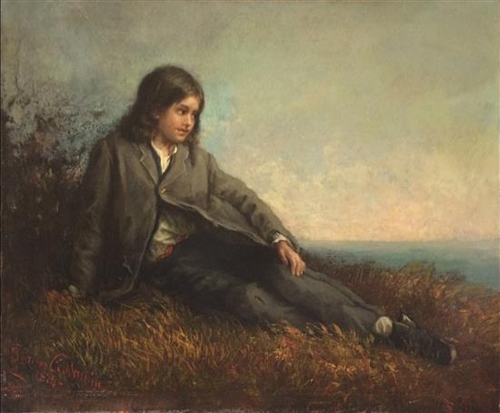 Young boy looking at the sea