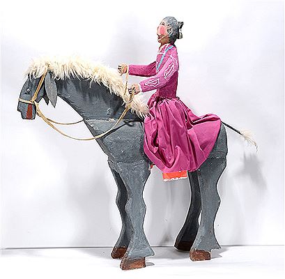 Navajo Woman On Horseback