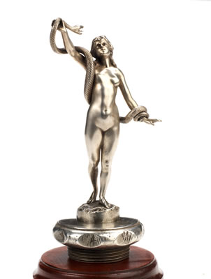 A 'SNAKE GIRL' MASCOT by Andre Caron - Auction record, sale price, and art valuation. Compare with similar artists and explore comparable artworks.