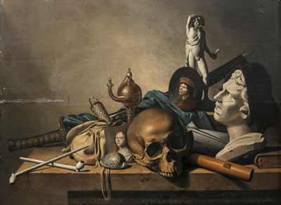 Still life of a sculptural bust, a skull, an oil lamp and other items on a stone ledge