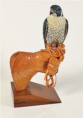 Peregrine Falcon on Glove In lime wood mounted on walnut