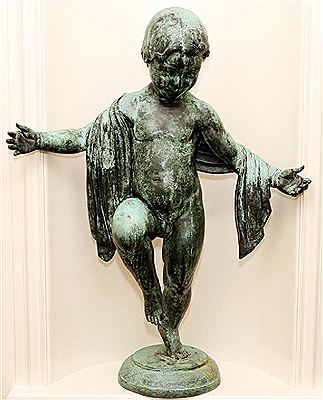 A nude child with out stretched arms