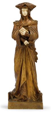 A figurine – “Le secret”