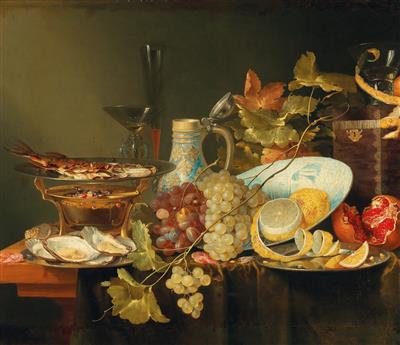 A still life of fruit, a chinese porcelain bowl and a fish on a stove