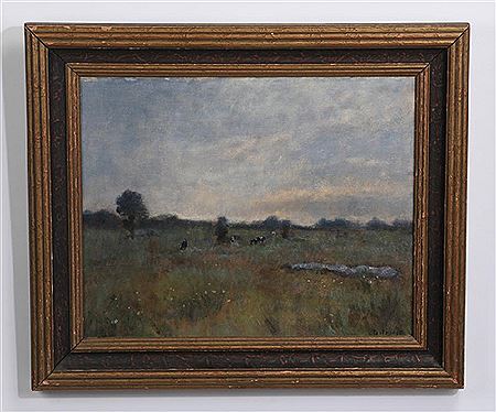 Cows in a field at dusk