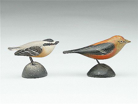 Two miniature songbirds
