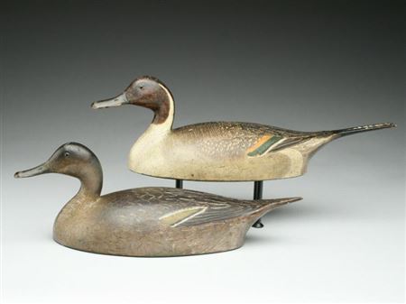 Exceedingly rare and important rigmate pair of hollow carved pintails