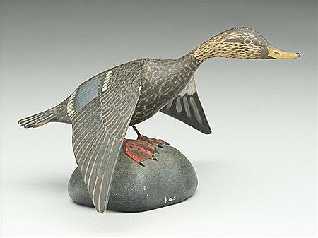 Extremely rare miniature flying black duck on wooden base