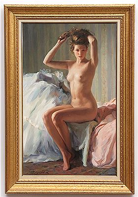 Female nude seated on a bed