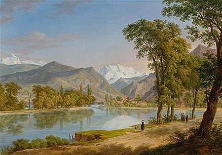 Walker by a mountain lake