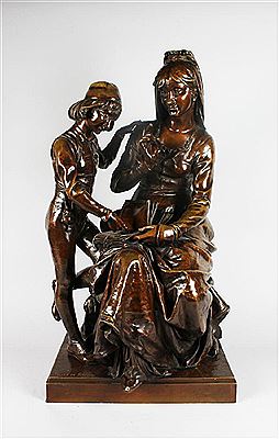 A MOTHER AND YOUNG BOY READING