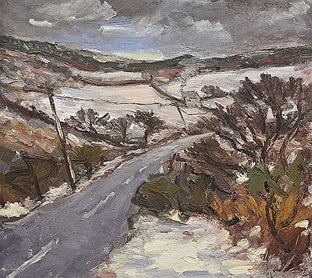 Road through the Clwydian Hills under snow with cottage and smoking chimney