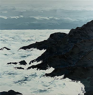 Stormy Anglesey coastal scape with distant mountains
