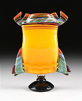 A CASED BLOWN PILLOW FORM GLASS VASE