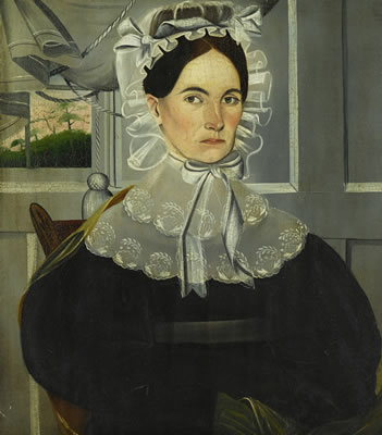 YOUNG WOMAN IN PANELED ROOM