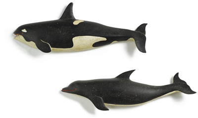 A PAIR OF CARVED WOODEN WHALES